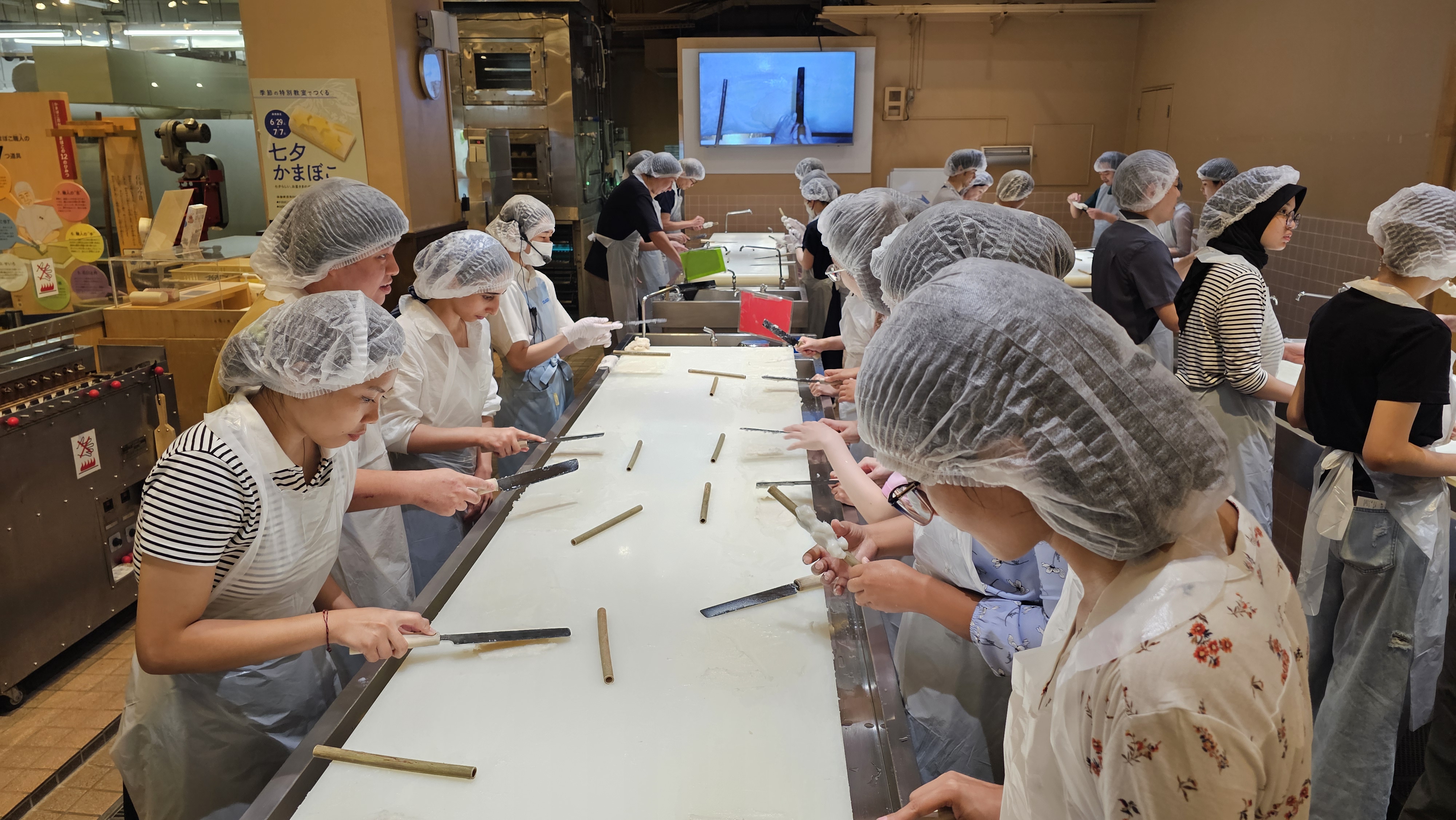 Students making kamaboko